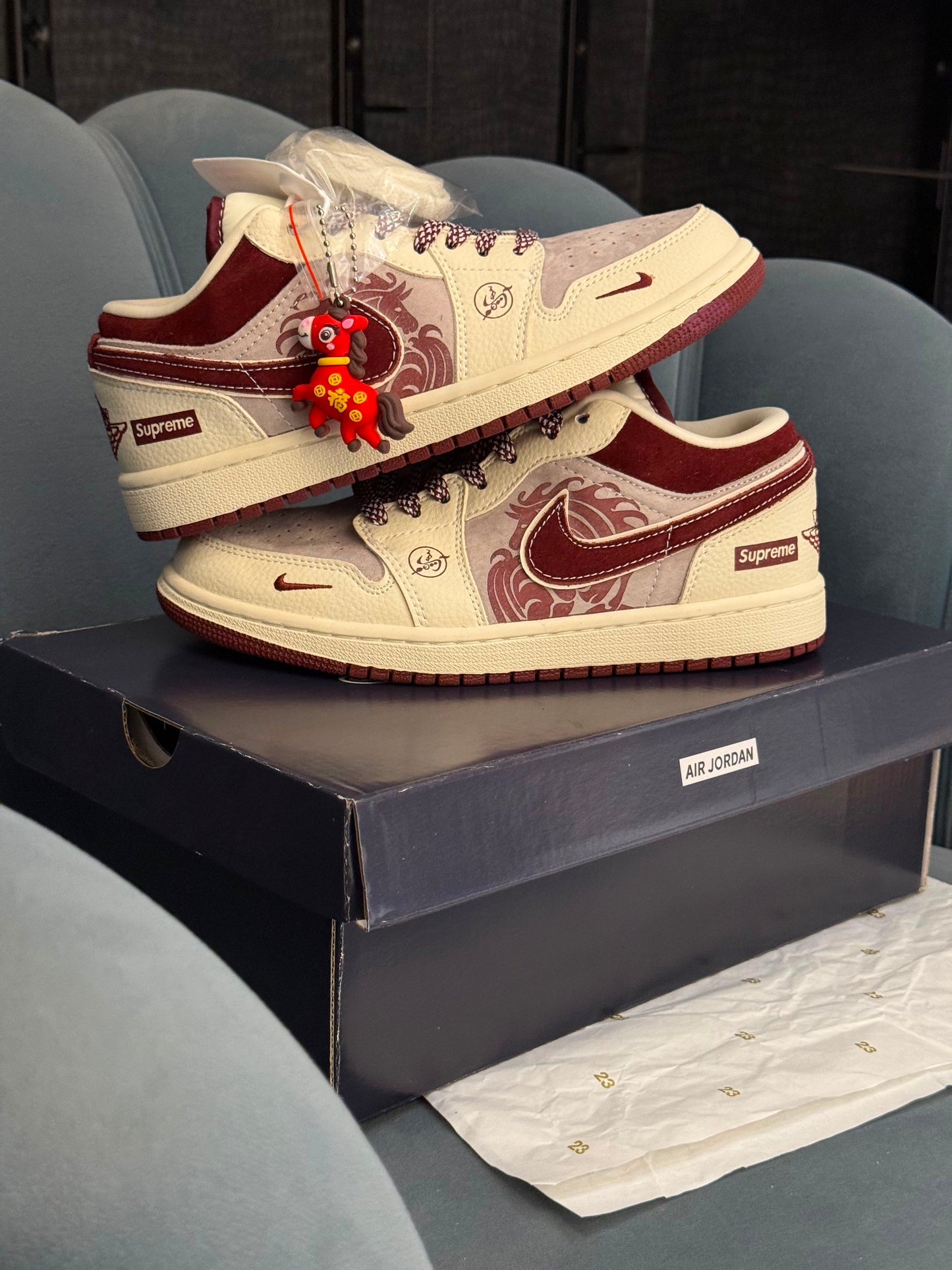 AIR JORDANS LOW x SUPREME "YEAR OF HORSE'