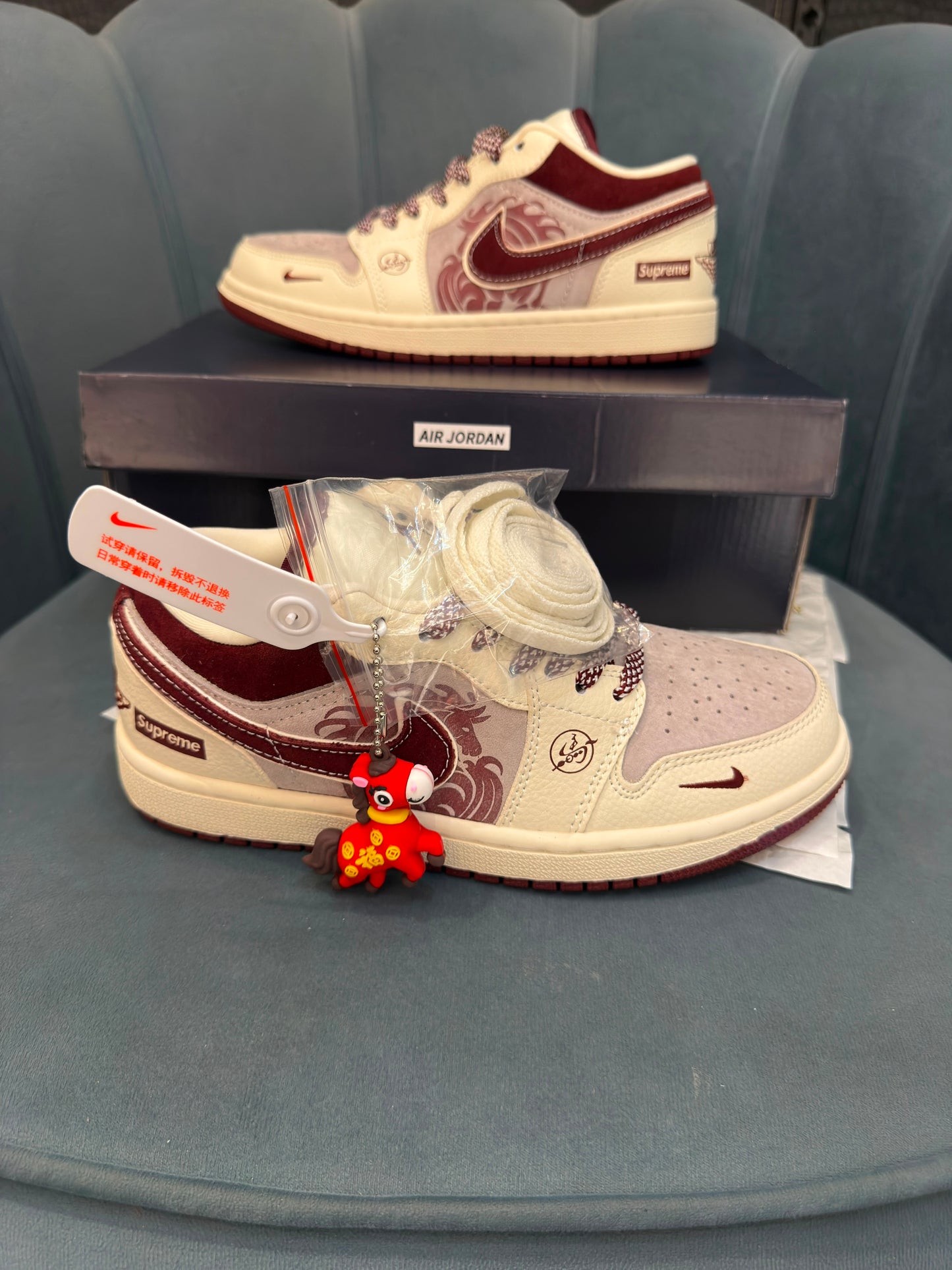 AIR JORDANS LOW x SUPREME "YEAR OF HORSE'